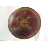 AN INDO-PERSIAN DHAL SHIELD 19th century, set with four brass studs and with elaborate painted