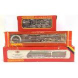 [OO GAUGE]. THREE B.R. LOCOMOTIVES comprising a Hornby No.R264, B.R. Class 9F 2-10-0 tender