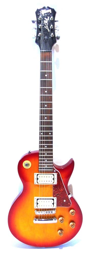 A GIBSON LES PAUL UNBRANDED COPY ELECTRIC GUITAR the solid body with twin pick-ups, in cherry