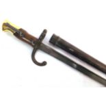 A FRENCH M1874 GRAS BAYONET of regulation pattern, the 52cm (20.5 inch) tri-form blade typically