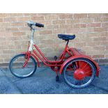 A GRESHAM FLYER DE LUXE CHILD'S TRICYCLE with a boot compartment, the red body lined in white and
