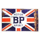 A B.P. MOTOR SPIRIT DOUBLE-SIDED ENAMEL SIGN with blue lettering against a red, white and blue Union