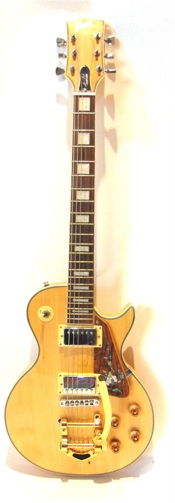 A GIBSON LES PAUL CUSTOM UNBRANDED COPY ELECTRIC GUITAR the solid body with a Bigsby style 'horse-