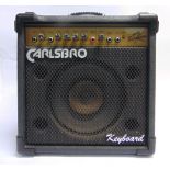 A CARLSBORO SCORPION K GUITAR / KEYBOARD AMPLIFIER with reverb, 41cm high, 40cm wide, 29cm deep.