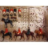 A BRITAINS LEAD HUNT COLLECTION comprising five mounted figures, five figures on foot, twenty-four