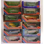 TWELVE 1/76 SCALE EXCLUSIVE FIRST EDITIONS DIECAST MODEL BUSES each mint or near mint and boxed.