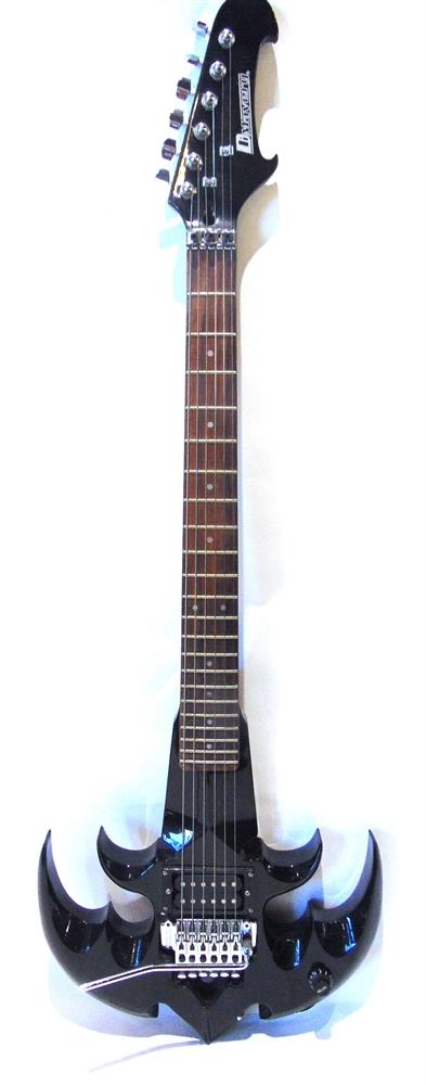 A DIMAVERY AXE-STYLE ELECTRIC GUITAR the solid body with a licensed 'Floyd Rdse' tremolo system,