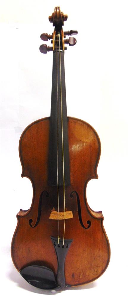 A VIOLIN with a 39cm two-piece back, labelled 'Manufactured in Berlin / Copy of / Joseph