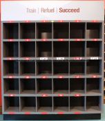 Floor-standing drinks storage rack from the first-team Boot Up Area at Liverpool Football Club's