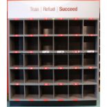 Floor-standing drinks storage rack from the first-team Boot Up Area at Liverpool Football Club's