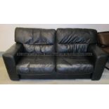 Black leather upholstered two-seater sofa from the First Team Changing Room at Liverpool Football