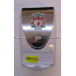 Hand sanitiser dispenser with LFC crest from the Laundry Room at Liverpool Football Club's Melwood