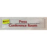 Clear acrylic PRESS CONFERENCE ROOM entrance door sign from the Main Reception Area at Liverpool