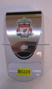 Hand sanitiser dispenser with LFC crest from the Gymnasium at Liverpool Football Club's Melwood