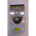 Hand sanitiser dispenser with LFC crest from the Gymnasium at Liverpool Football Club's Melwood