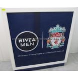 'Nivea Men' free-standing grooming unit with integral framed mirror, from the First Team Changing