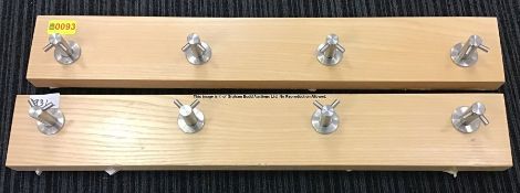 Two coat peg racks from Changing Room 'A' at Liverpool Football Club's Melwood Training Ground, each
