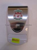 Hand sanitiser dispenser with LFC crest from the Treatment Room at Liverpool Football Club's Melwood