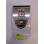 Hand sanitiser dispenser with LFC crest from the Treatment Room at Liverpool Football Club's Melwood