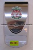 Hand sanitiser dispenser with LFC crest from the First Team Changing Room, at Liverpool Football