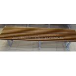 Wood-slatted bench from the first-team Boot Up Area at Liverpool Football Club's Melwood Training
