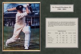 Sir Don Bradman signed colour photograph display, the image portraying a front foot drive in the