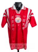 A red China No.17 home jersey, unknown player, circa 1990s, short sleeved country emblem badge and