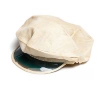 An original white fabric tennis cap with visor, circa 1930s, peaked cap with bluish plastic visor,