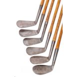 A matched set of six Tom Morris 'Elect' irons early 20th century, hickory shafted, good condition