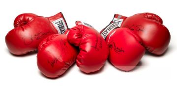 Group of five autographed boxing gloves, all red Everlast, with signatures in black marker pen,