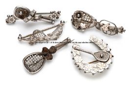 Five tennis related brooches, comprising of a horseshoe and racquet with gilt floral highlights,