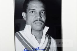 West Indian cricketer Gary Sobers signed framed photograph, b&w portrait photo signed in blue