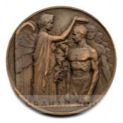 1924 Paris Olympic Games bronze participation medal, designed by Raoul Bernard, of circular form,