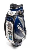 Mike Weir multi-signed Golf Tour bag, approx. 28 golfers' signatures including Watson, Westwood,