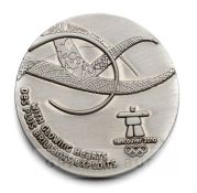 2010 Vancouver Winter Olympic Games volunteer's participation medal, pewter, of circular form,