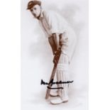 Don Bradman signed photographic presentation, 16 by 10cm. b&w photograph portraying Bradman as a