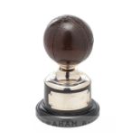 Cricket ball trophy awarded to Lancashire’s Malcolm Hilton for his performances during the 1949