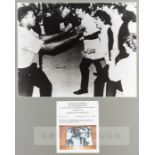 Signed b & w photograph of Muhammad Ali with the Beatles at 5th Street Gym, Miami Beach, Florida,