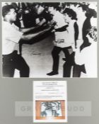 Signed b & w photograph of Muhammad Ali with the Beatles at 5th Street Gym, Miami Beach, Florida,