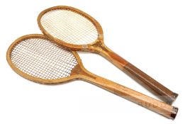 Two wooden framed tennis racquets early 20th century, the first with convex wedge bearing 'Best is