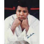 Muhammad Ali signed photograph, 10 by 8in. colour signed in blue marker pen, the image portraying