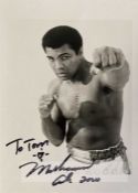 Muhammad Ali signed b&w photograph, 7 by 5in., signed in 2000 with dedication “To Tom”