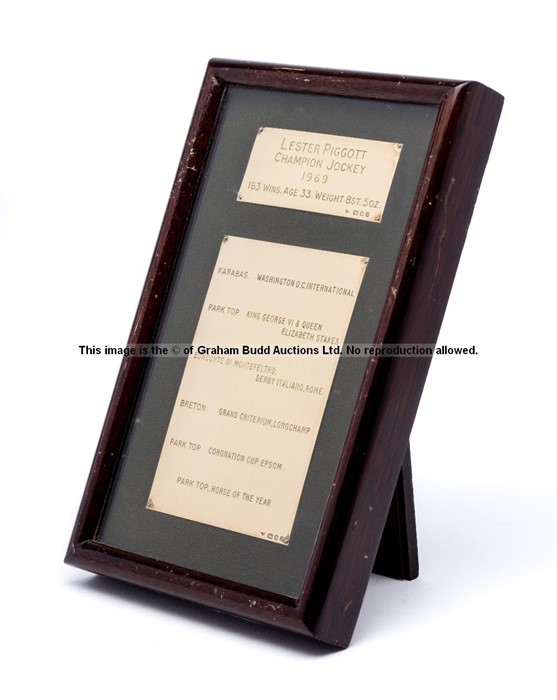 Framed commemoration of jockey Lester Piggott's achievements during 1969, two silver gilt plates