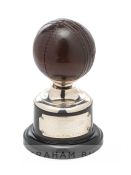 Cricket ball trophy awarded to Lancashire’s Malcolm Hilton for his performances during the 1949