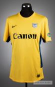 Zhen Peng Wang yellow Kitchee FC No.1 goalkeeper jersey v Arsenal pre-season friendly at Hong Kong