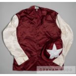 Racing colours of Sheikh Mohammed 1990s, maroon with white sleeves and star on cap, signed by the