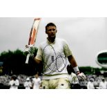 Joe Root (England) signed New Balance mini-bat and action photograph, colour photo 8 by 12in.,