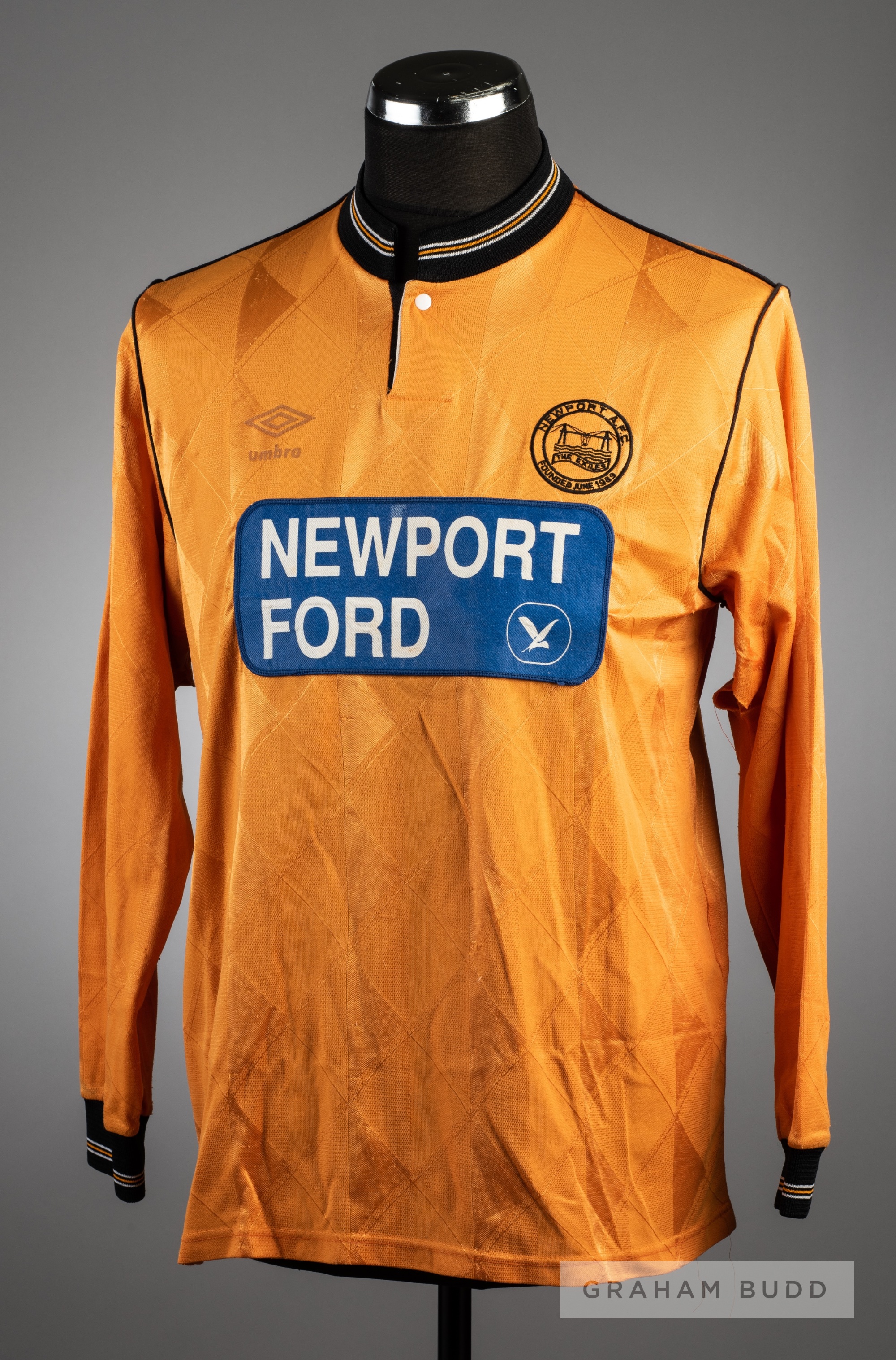 Amber Newport County AFC No.14 substitute's jersey from the club's reformation season in 1989-90, by