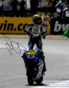 Valentino Rossi (ITA) signed collection, comprising replica Dainese glove and 8 by 10in. photo, both