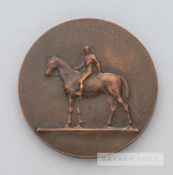 A Fegentri bronze horse racing medallion presented to Luca Cumani, of circular form, obverse with